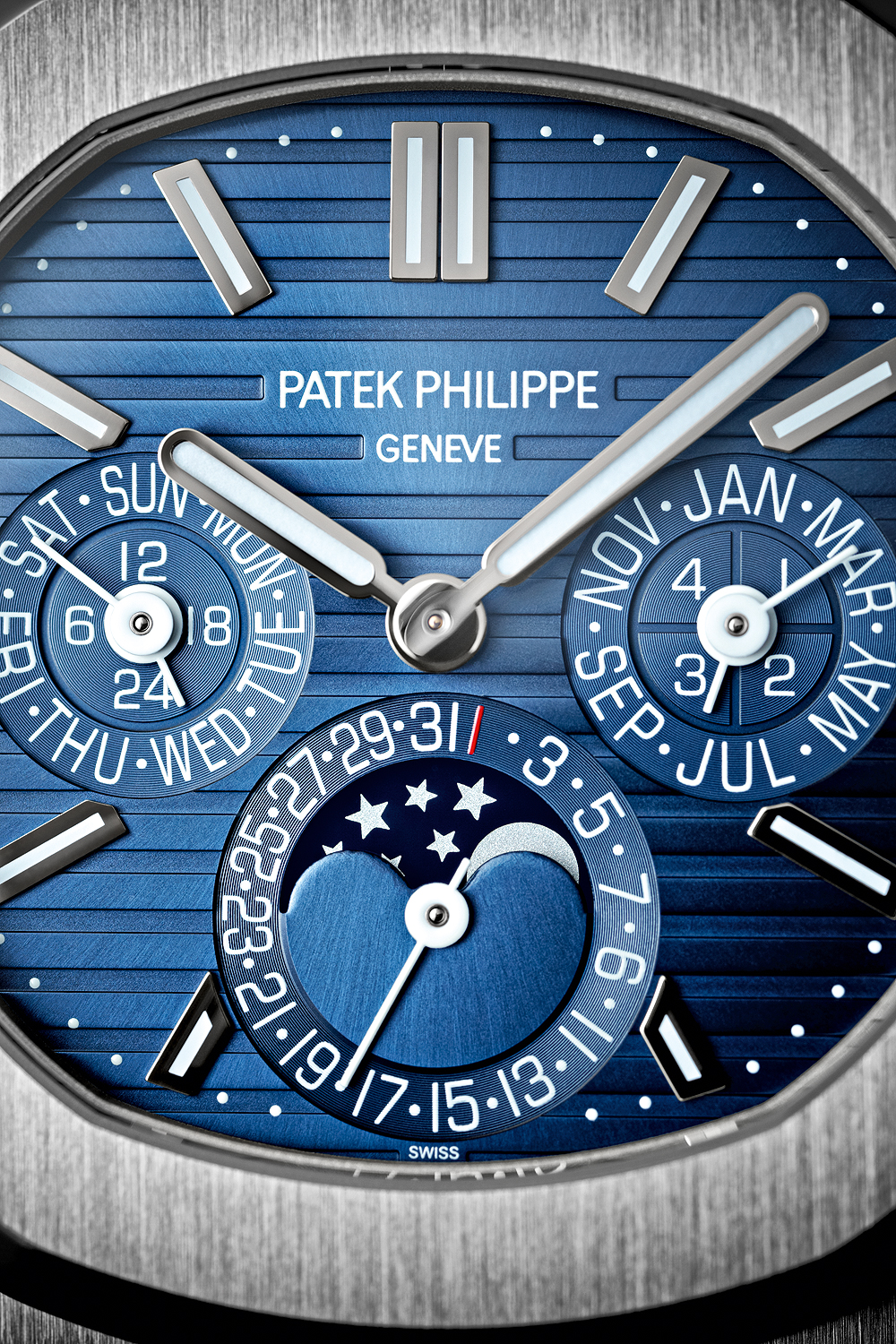Patek Philippe Nautilus Perpetual Calendar Sunburst White Gold/ Blue Dial (Ref#5740/1G-001)